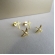 Duo de Cruz e Espírito Santo Banhado em Ouro 18k - Dourado