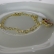 Pulseira Com Laço De Zircônias Coloridas Banhado em Ouro 18k - Dourado