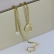 Brinco Argolinha Corrente com Ponto de Luz e Piercing Fake Banhado em Ouro 18k - Dourado