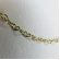 Choker com Coração Vazado Pequeno Interligado Banhado em Ouro 18k - Dourado