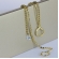 Brinco Argolinha Corrente com Ponto de Luz e Piercing Fake Banhado em Ouro 18k - Dourado