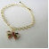 Pulseira Com Laço De Zircônias Coloridas Banhado em Ouro 18k - Dourado