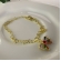 Pulseira Com Laço De Zircônias Coloridas Banhado em Ouro 18k - Dourado