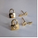 Brinco Duo Chave e Cadeado Banhado em Ouro 18k - Dourado