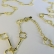 Colar com Corrente Detalhada com Flor Vazada Banhado em Ouro 18k - Dourado