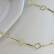 Colar com Corrente Detalhada com Flor Vazada Banhado em Ouro 18k - Dourado