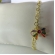 Pulseira Com Laço De Zircônias Coloridas Banhado em Ouro 18k - Dourado