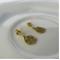 Brinco Pequeno de Flor Vazada com Zircônia Banhado em Ouro 18k - Dourado