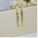 Brinco de Fita com Zircônia Banhado em Ouro 18k - Dourado