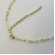 Choker com Coração Vazado Pequeno Interligado Banhado em Ouro 18k - Dourado
