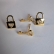 Brinco Duo Chave e Cadeado Banhado em Ouro 18k - Dourado