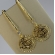 Brinco Médio De Fio Trabalhado e Flor Vazada Banhado em Ouro 18k - Dourado