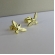 Brinco Pequeno de Espirito Santo Banhado em Ouro 18k - Dourado